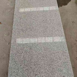 巴中芝麻白光面毛板